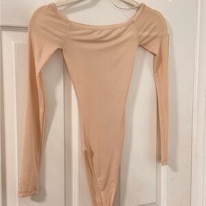Small see through nude color body suit used once.